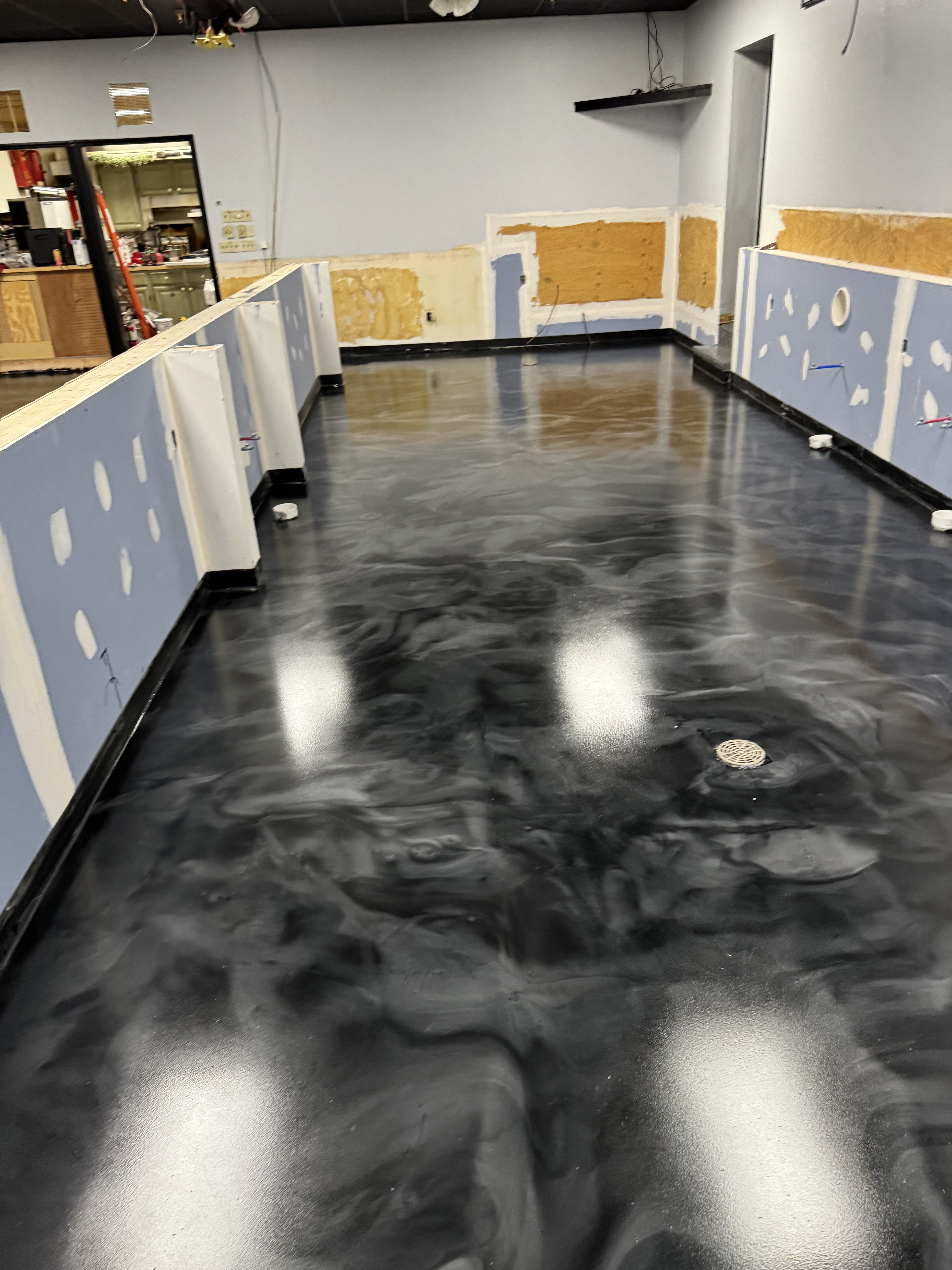 Metallic epoxy flooring in a commercial space